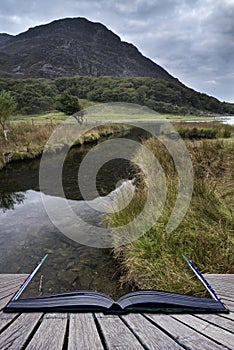 Landscape image of mountain reflected in still lake on Summer mo