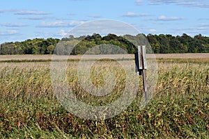 Landscape image of prairie lake area of Minnesota Department of Natural resources near Nicollet with Duck house