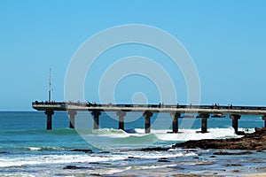 A landscape image of the Shark Rock Pier in Port Elizabeth, South Africa.