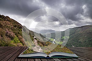 Landscape image of view from Precipice Walk in Snowdonia overlooking Barmouth and Coed-y-Brenin forest coming out of pages in