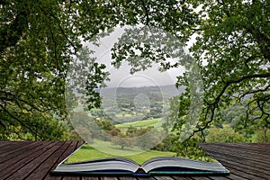Landscape image of view from Precipice Walk in Snowdonia overlooking Barmouth and Coed-y-Brenin forest coming out of pages in photo