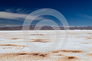 Landscape of incredibly white salt flat Salar de Uyuni, amid the Andes in southwest Bolivia, South America