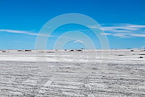 Landscape of incredibly white salt flat Salar de Uyuni, amid the Andes in southwest Bolivia, South America