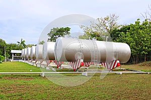 Landscape, industrial work, storage space, large oil storage tanks, outdoor lots