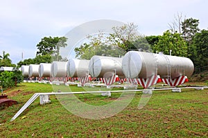 Landscape, industrial work, storage space, large oil storage tanks, outdoor lots