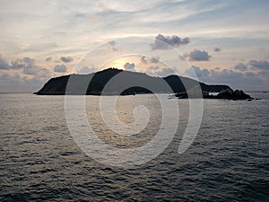 landscape with the island of La Roqueta in Acapulco at dusk