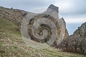 Landscape of Karadag Reserve in spring. View of rocks of ridge Karagach. Crimea