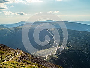 Landscape of Karkonosze National Park. Late afternoon mist over the mountains. Slightly blurred view.