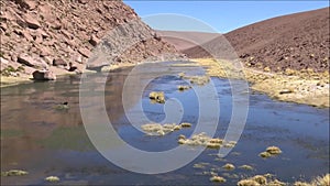 Landscape of lagoon, mountains and salt flats in Atacama desert, Chile