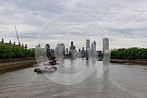Landscape of Lambeth Bridge over the River Thames with modern buildings in the background, London