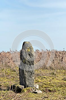 Landscape with large ancient standing stone on midgley moor in west yorkshire