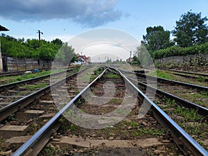 Landscape with leading railroad tracks
