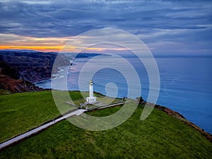 Landscape with the Lighthouse of Lastres, Asturias photo