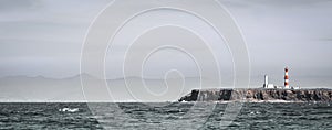 Landscape with a lighthouse from the sea at Ensenada, Mexico