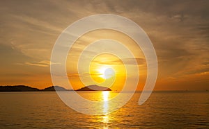 Landscape Long exposure of majestic clouds in the sky sunset or sunrise over sea with reflection in the tropical sea.Beautiful