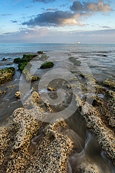 Landscape looking out to sea with rocky coastline and beautful v