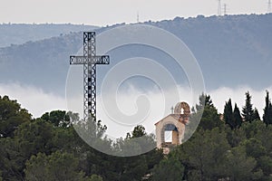 Landscape with low clouds after the top of the San Cristobal peak in Alcoy photo