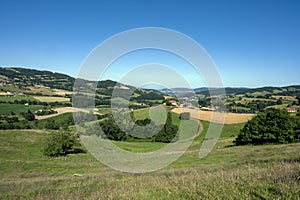 Landscape of the Lyonnais mountains around the village of Montrottier in summer in France