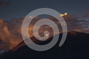 Landscape with Machapuchare-Fishtail peak at sunset view from Ghandruk during trekking in Himalaya Mountains, Nepal