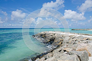 Landscape Maldive island blue ocean white sand and stones ashore