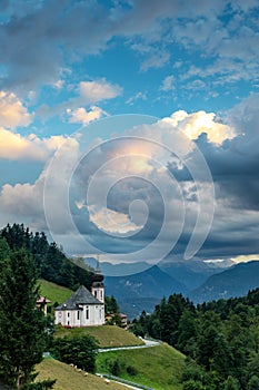 Landscape with Maria Gern Church, Bavarian Alps with Watzmann Mountain and Dramatic Sky, Germany photo