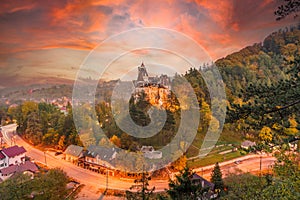 Landscape with medieval Bran castle at sunset