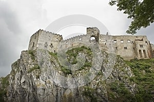 Landscape with a medieval castle on top of a mountain