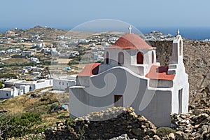 Landscape with medieval fortress and White church, Mykonos island, Greece
