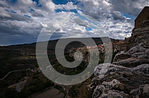 Landscape of the medieval town of Cantavieja with the houses on the edge of the cliff. Teruel, Spain