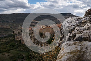 Landscape of the medieval town of Cantavieja with the houses on the edge of the cliff. Teruel, Spain