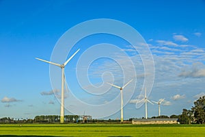 landscape with modern windturbines for the sustainable production of electricity