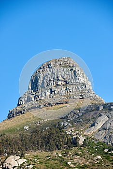 Landscape of a mountain on a blue sky background with copy space. Beautiful nature view of Lions Head rocky mountains