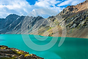 Landscape with mountain lake Ala-Kul, Kyrgyzstan.