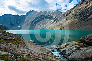 Landscape with mountain lake Ala-Kul, Kyrgyzstan.