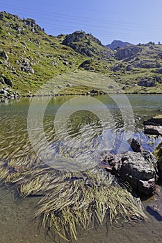 Landscape of the mountain lake in Pas de la Coche photo