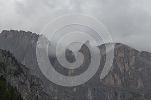 Landscape with mountain massif in a foggy day, Dolomites, Italian Alps