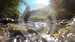 Landscape mountain river, mountains, forest, stones and blue sky