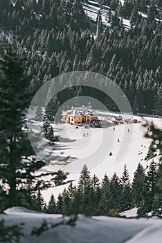 Landscape of mountain ski center with skiers