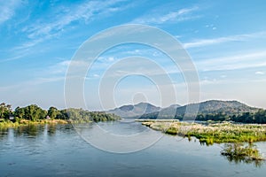 Landscape of mountain, tree, grass and the river