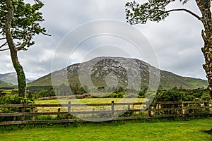 Landscape of a mountain and valley near fences