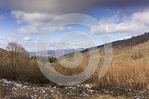 Landscape with mountain views in the distance above the town of Varbitsa