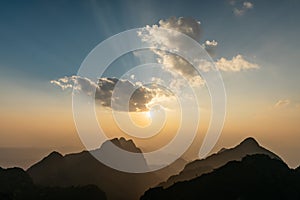 The landscape of Mountains, cloud with sunray and dusk near the sunset of Doi Luang, Chiang Dao, Chiang Mai, Thailand.