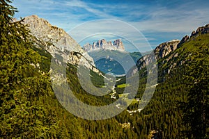 landscape with mountains, clouds and forest