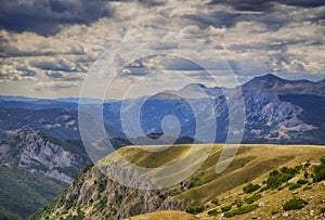 Landscape with mountains and clouds in the sunset. Picture is captured in Montenegro highs, highest peaks of mountain Durmitor.