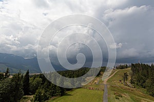 Landscape with mountains and cloudy sky