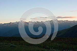 Landscape with mountains and hills while sunset. The Svanetian range.