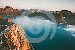 Landscape mountains and sea fjord sunset scenery in Norway