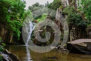 Landscape in the MourÃÂ£o Waterfall, AnÃÂ§os - Sintra, Portugal photo