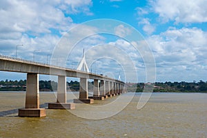 Landscape of Mukdahan Thai-Laos Friendship Bridge II viewpoint at Mekong river in cloudy blue sky background at Mukdahan province