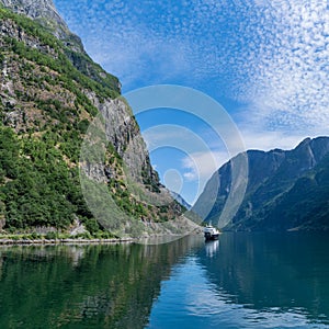 Landscape of the Naeroyfjord from the pier of Gudvangen. Naeroyfjord Neroyfjord offshoot of Sognefjord is the narrowest fjord in